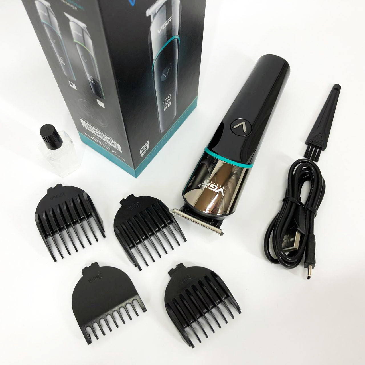 Профессиональная машинка для стрижки волос триммер VGR V-291 с насадками, электробритва. Цвет: зеленый