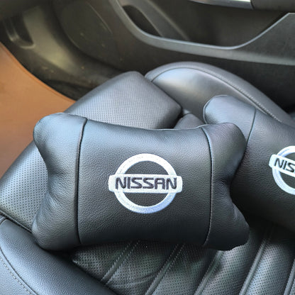 Подушки в авто 2 шт Nissan, натуральная кожа, с логотипом Ниссан, на подголовник для вашей машины