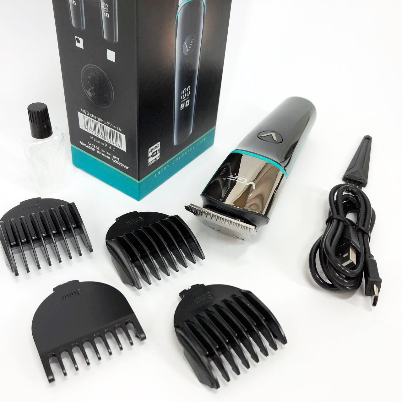 Профессиональная машинка для стрижки волос триммер VGR V-291 с насадками, электробритва. Цвет: зеленый