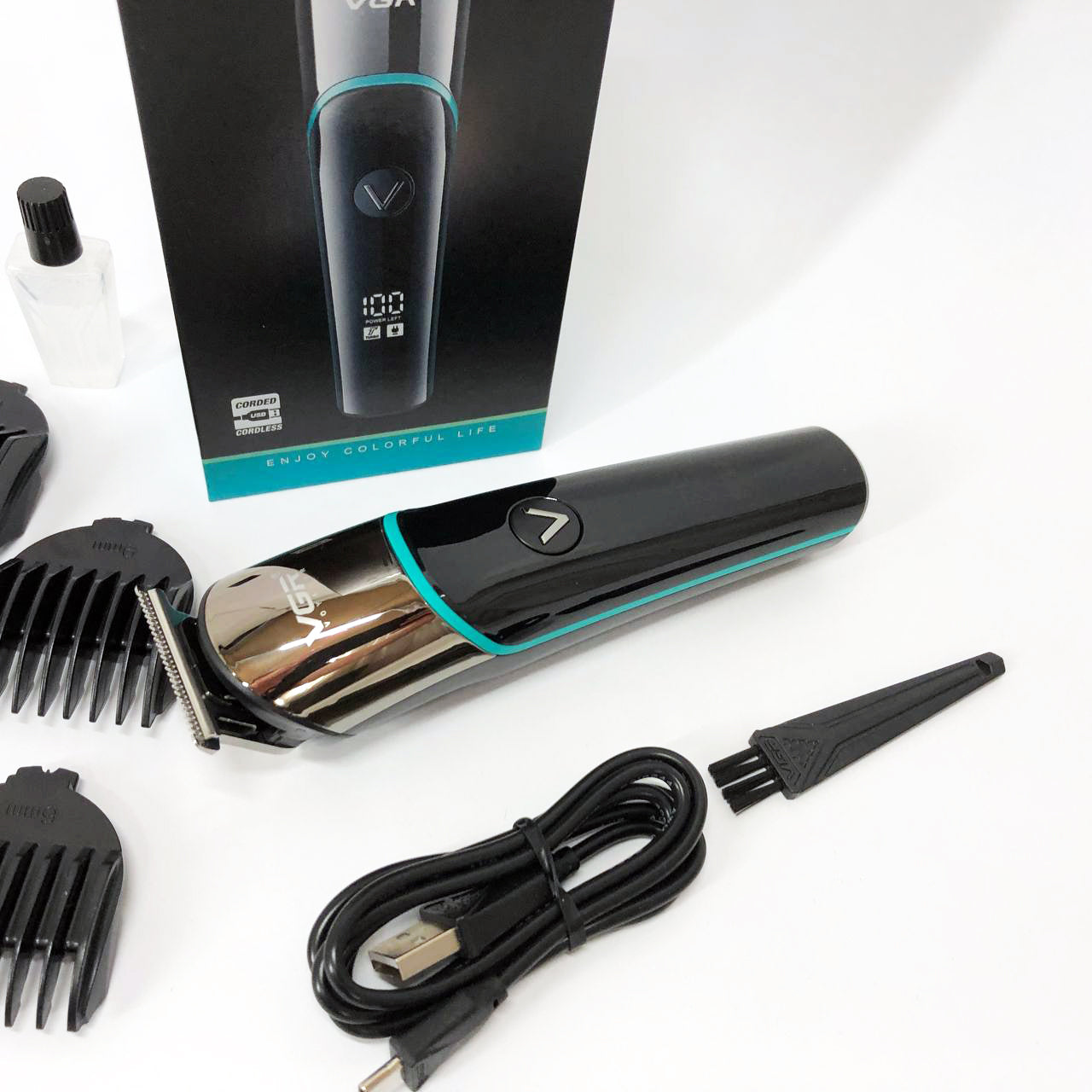 Профессиональная машинка для стрижки волос триммер VGR V-291 с насадками, электробритва. Цвет: зеленый