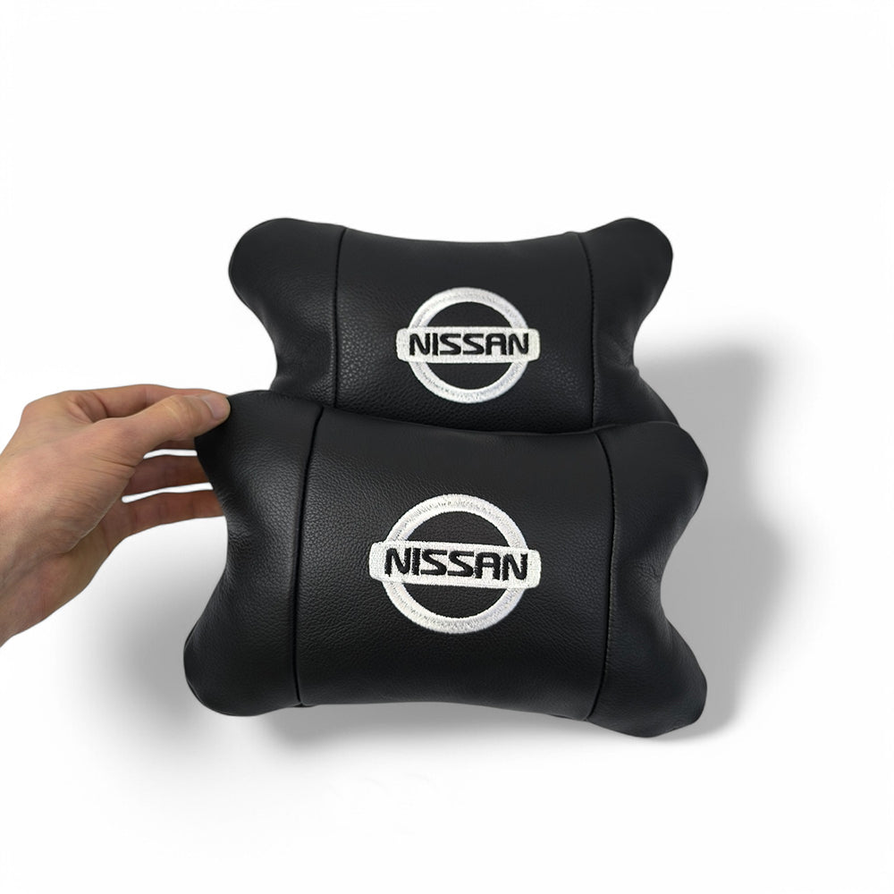 Подушки в авто 2 шт Nissan, натуральная кожа, с логотипом Ниссан, на подголовник для вашей машины