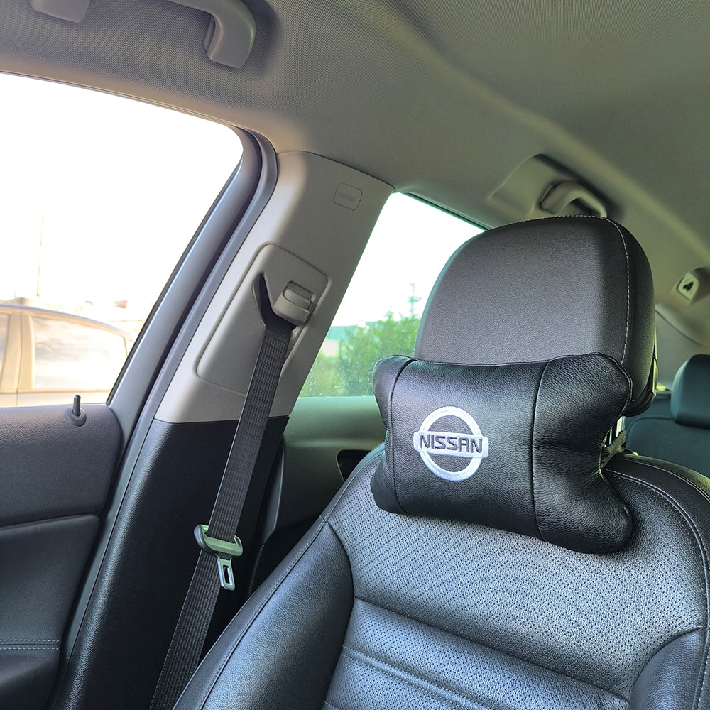 Подушки в авто 2 шт Nissan, натуральная кожа, с логотипом Ниссан, на подголовник для вашей машины