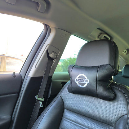 Подушки в авто 2 шт Nissan, натуральная кожа, с логотипом Ниссан, на подголовник для вашей машины
