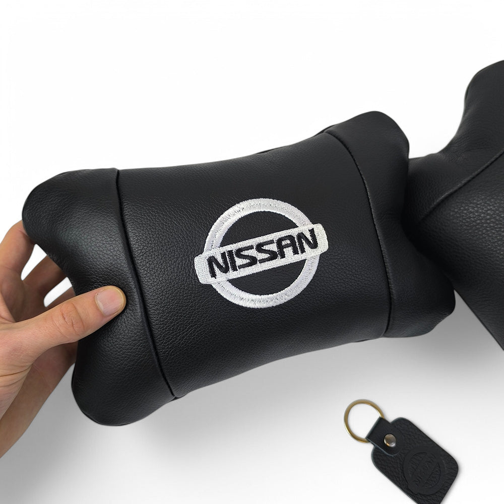 Подушки в авто 2 шт Nissan, натуральная кожа, с логотипом Ниссан, на подголовник для вашей машины