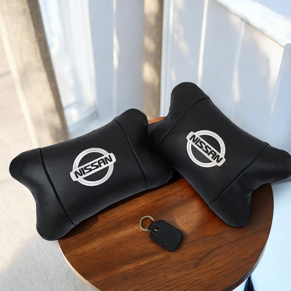 Подушки в авто 2 шт Nissan, натуральная кожа, с логотипом Ниссан, на подголовник для вашей машины