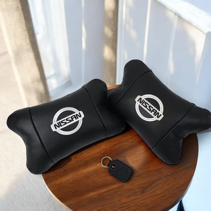 Подушки в авто 2 шт Nissan, натуральная кожа, с логотипом Ниссан, на подголовник для вашей машины