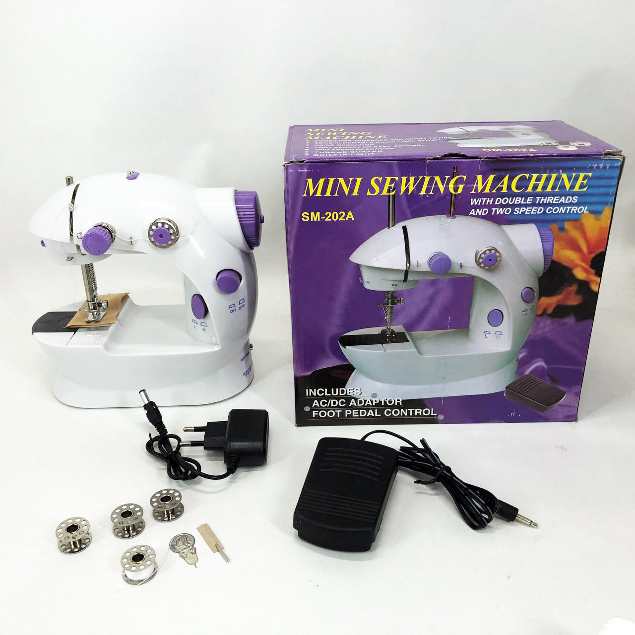 Мини швейная машинка FHSM 202 4 в 1 с педалью и подсветкой + адаптер 220V, Швейная машина для детей