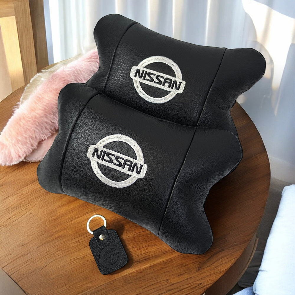 Подушки в авто 2 шт Nissan, натуральная кожа, с логотипом Ниссан, на подголовник для вашей машины
